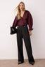 Trendyolmilla Siyah Diagonel Pileli Düğmeli Wide Leg/Geniş Paça Örme Pantolon TWOAW26PL00041