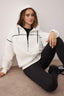 Trendyolmilla Ekru Kapüşonlu ve Biye Detaylı Oversize/Geniş Kalıp Örme Sweatshirt TWOAW26SW00106