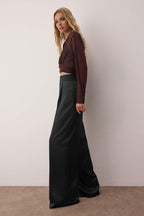 Trendyolmilla Bej Bol Paça Dokuma Saten Pantolon TPRSS23PL00001