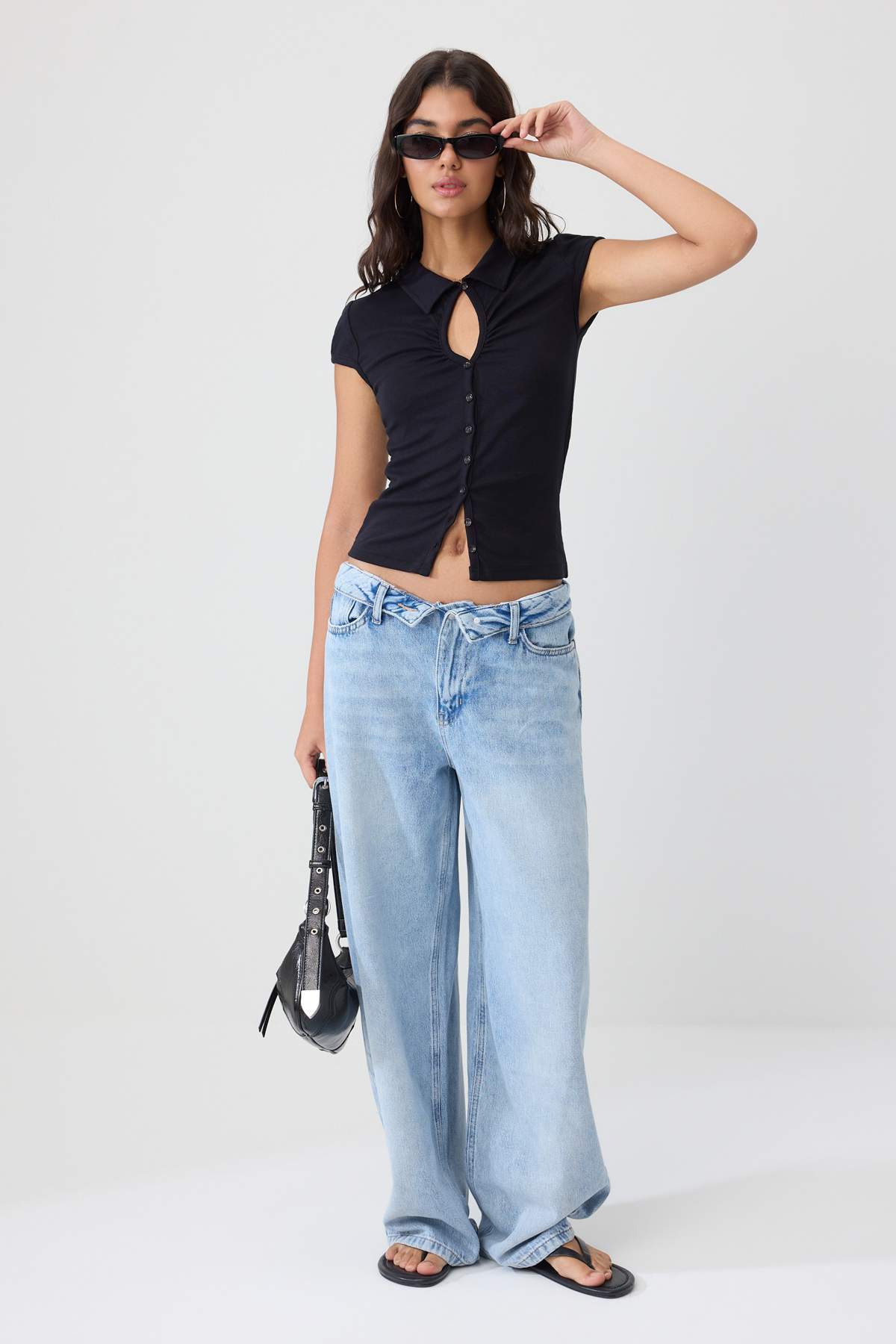 black plain fitted keyhole neck buttoned crescent sleeve