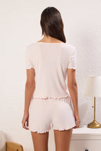 Trendyolmilla Ekru Dantel ve Gül Aksesuar Detaylı Fitilli Şortlu Örme Pijama Takımı THMSS25PT00417