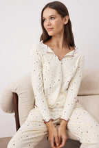 Trendyolmilla Pembe Pamuklu Likralı Yumuşak Tuşe Kalpli Baby Overlok Detaylı Örme Pijama TakımıTHMAW26PT00166