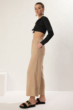 Trendyolmilla Vizon Modal Cep Detaylı Wide Leg/Geniş Paça Pileli Dokuma Pantolon TWOSS25PL00081 Palazzo
