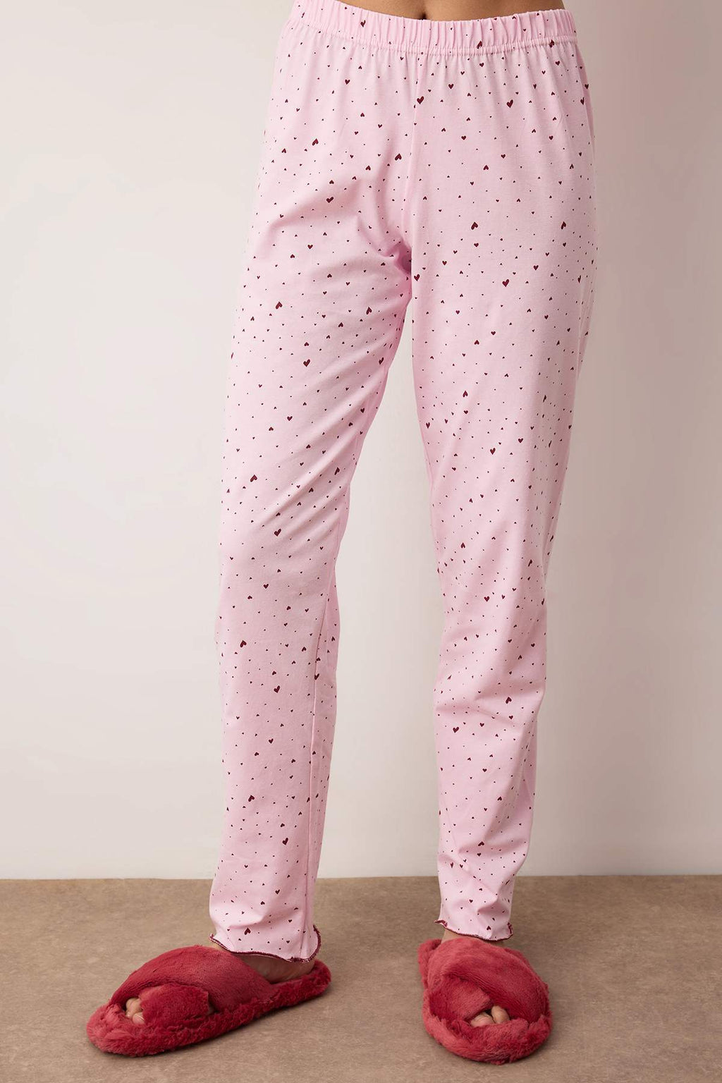 Trendyolmilla Pembe Pamuklu Likralı Yumuşak Tuşe Kalpli Baby Overlok Detaylı Örme Pijama TakımıTHMAW26PT00166