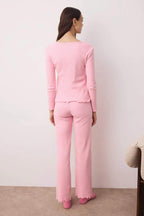 Trendyolmilla Pembe V Yaka Baby Overloklu Yumuşak Tuşe Fırçalı Kışlık Fitilli Örme Pijama Takımı THMAW26PT00011
