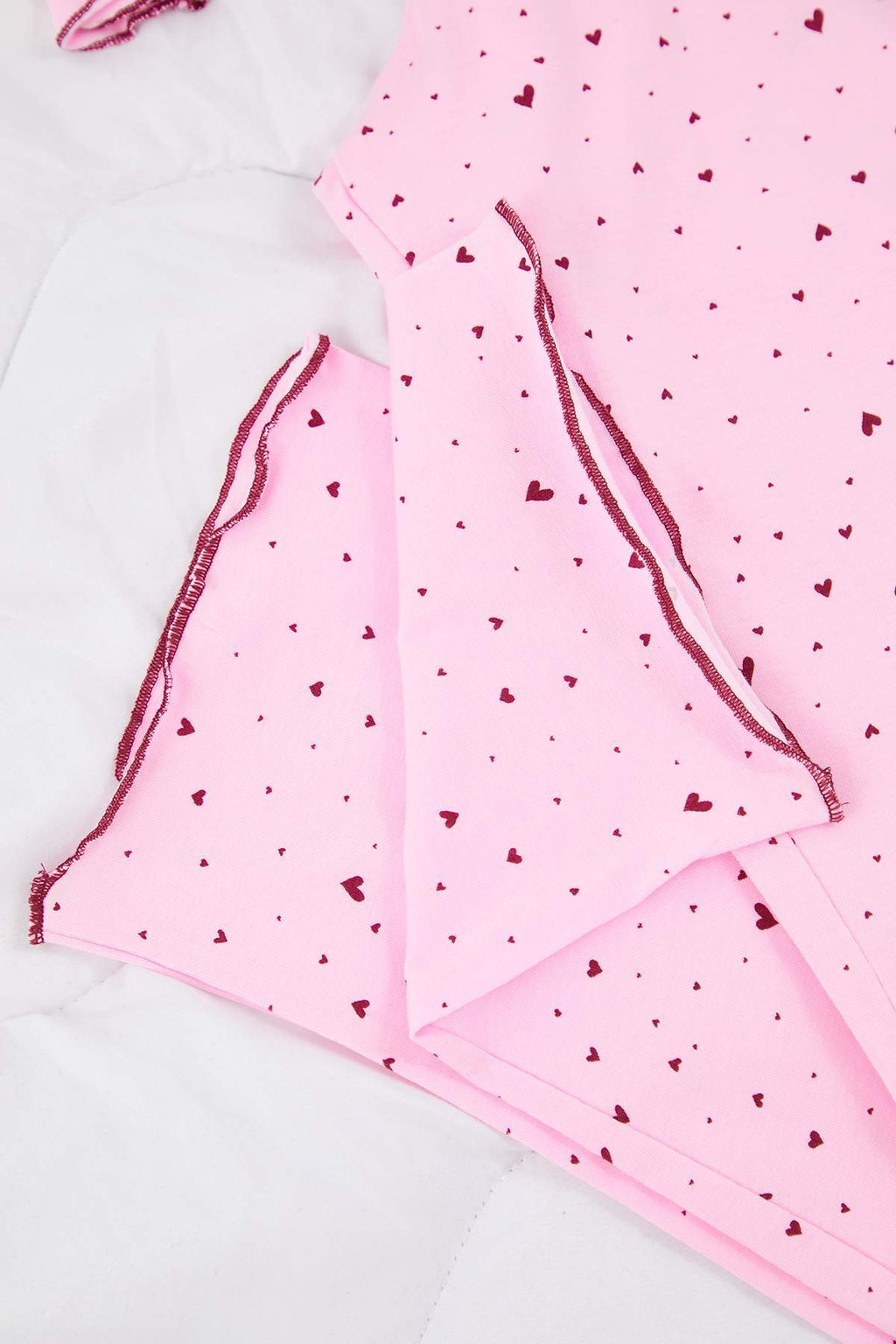 Trendyolmilla Pembe Pamuklu Likralı Yumuşak Tuşe Kalpli Baby Overlok Detaylı Örme Pijama TakımıTHMAW26PT00166