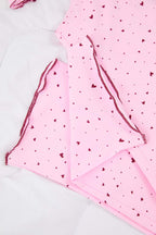 Trendyolmilla Pembe Pamuklu Likralı Yumuşak Tuşe Kalpli Baby Overlok Detaylı Örme Pijama TakımıTHMAW26PT00166