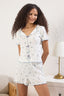 Trendyolmilla Beyaz %100 Pamuklu Çiçekli Kurdele/Fiyonklu Fitilli Şortlu Örme Pijama Takımı THMSS25PT00434