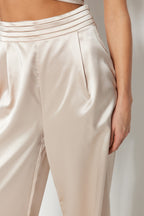Trendyolmilla Bej Bol Paça Dokuma Saten Pantolon TPRSS23PL00001