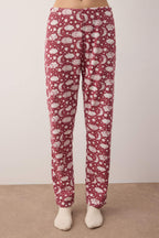 Trendyolmilla Siyah Pamuklu Leopar Desenli ve Yılbaşı Temalı Uyku Bantlı Örme Pijama Takımı THMAW25PT00223