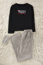 Trendyolmilla Siyah Pamuklu Leopar Desenli ve Yılbaşı Temalı Uyku Bantlı Örme Pijama Takımı THMAW25PT00223