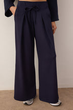 Trendyolmilla Taş Wide Leg Yumuşak Kumaşlı Pilili Esnek Örme Pantolon TWOAW26PL00138