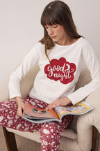 Trendyolmilla Siyah Pamuklu Leopar Desenli ve Yılbaşı Temalı Uyku Bantlı Örme Pijama Takımı THMAW25PT00223