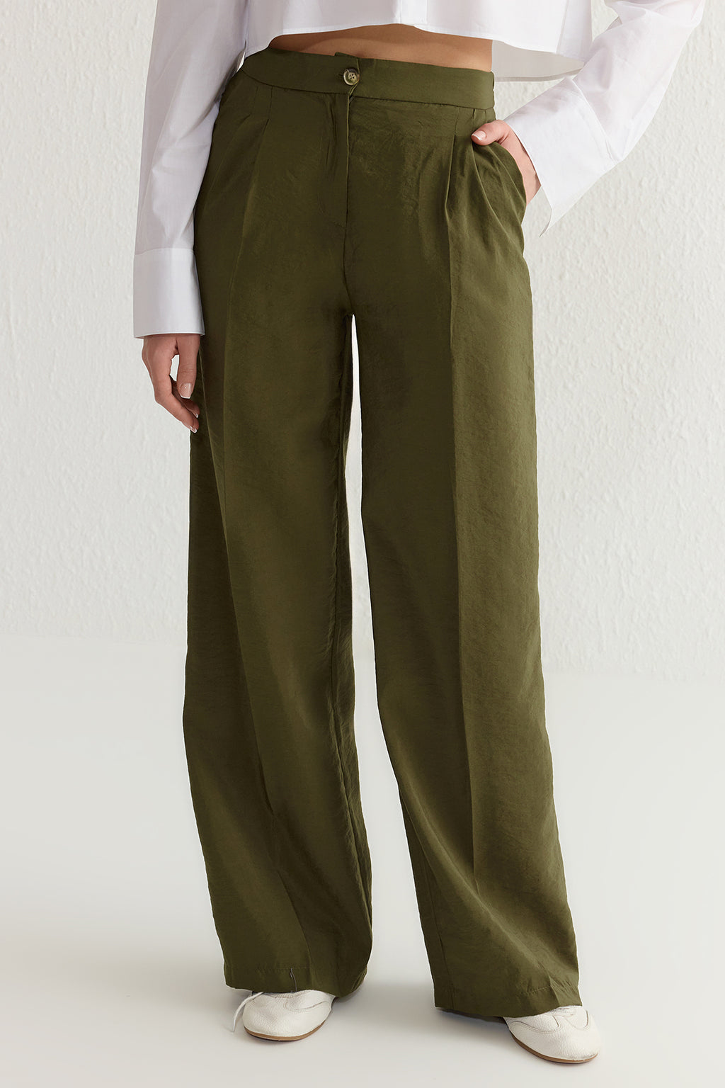Trendyolmilla Bej Yumuşak Tuşeli Wide Leg/Geniş Paça Dokuma Pantolon TWOSS25PL00004