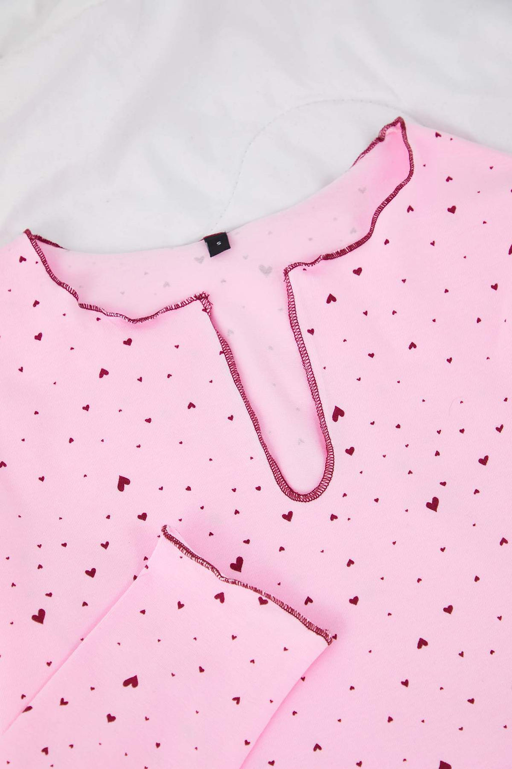 Trendyolmilla Pembe Pamuklu Likralı Yumuşak Tuşe Kalpli Baby Overlok Detaylı Örme Pijama TakımıTHMAW26PT00166