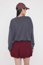 Trendyolmilla Ekru Relaxed/Rahat Kalıp Beli Lastikli Crop Örme Sweatshirt TWOAW26SW00000